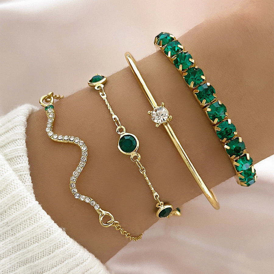 Armbandenset met groene steentjes, set van 4 goudkleurige armbanden: bangle, stretcharmband en twee schakelarmbanden | Covesville