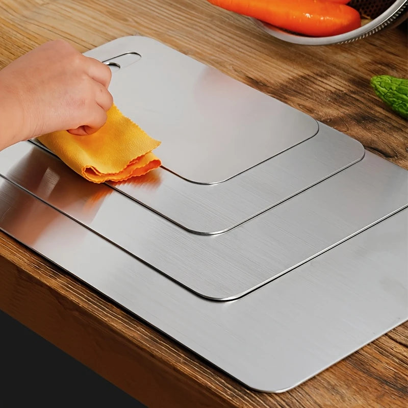 Metalen snijplank in drie maten, glad werkvlak met ophangopening, kleine of middelgrote plank en een set van drie | Covesville